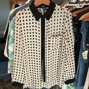 Cream blouse trimmed in black w/black squares